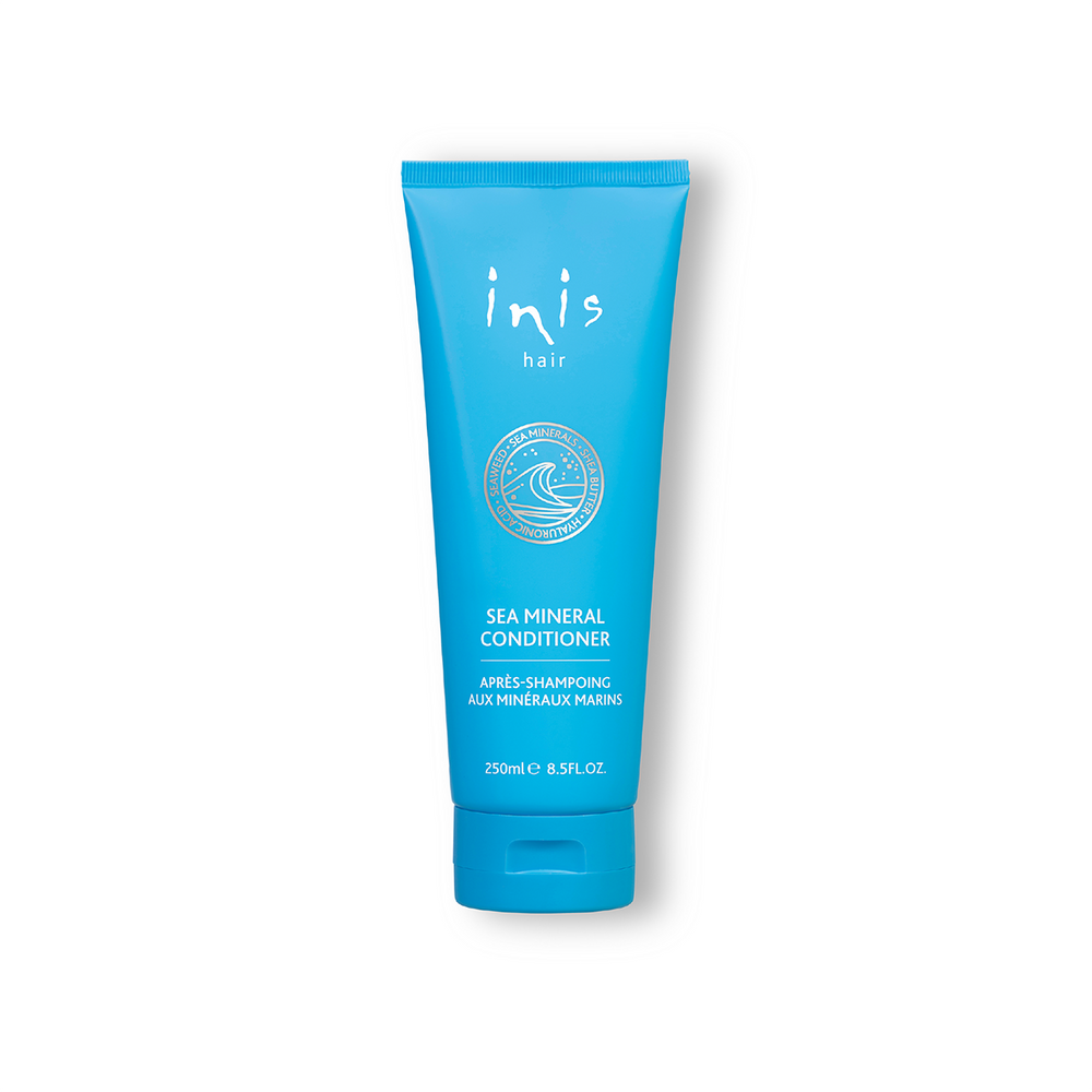 Blue tube of inis hair sea mineral conditioner on a white background